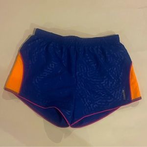Reebok leopard print blue athletic shorts